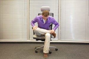 Seated Hip Stretch Exercise for Neck and Lower Back Discomfort
