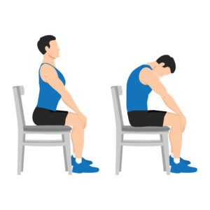 Man in a chair performing seated forward flexion and lumbar extension exercise. 