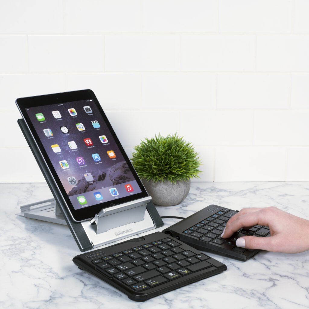 Go!2 Mobile Keyboard with Goldtouch Laptop Stand. An iPad sits on the Laptop Stand. 
